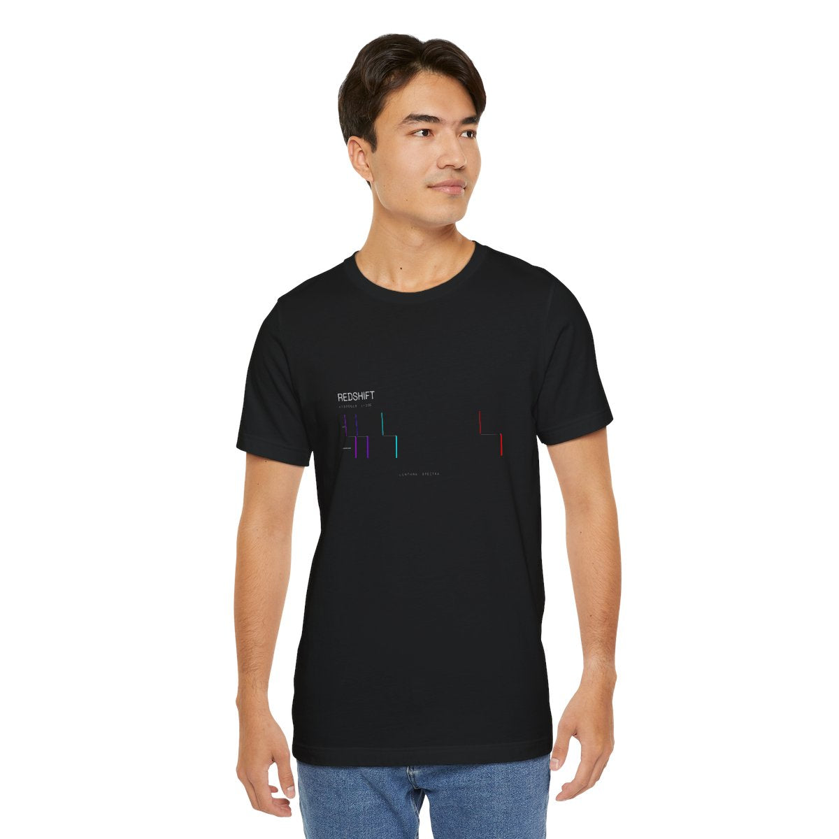 Redshift Spectra tee worn by a model — hydrogen's lines, rest and redshifted, printed on black cotton.